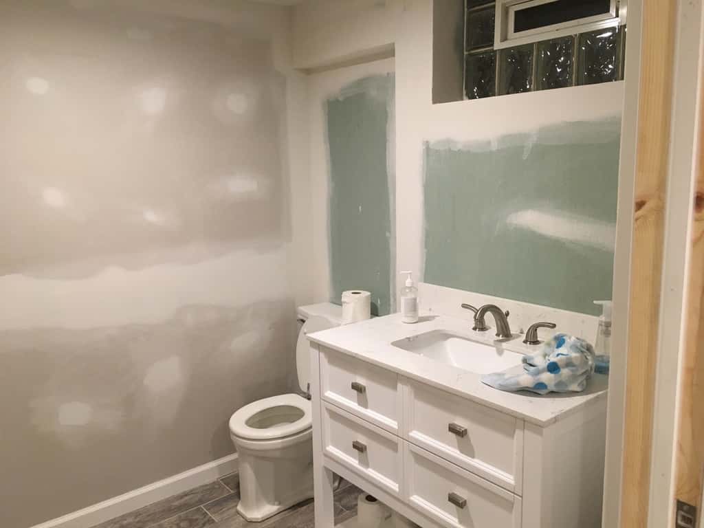 It still needs to be painted, but after four weeks our basement looks so much nicer!