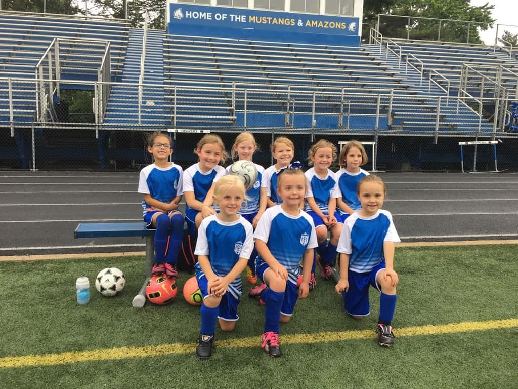 Last soccer game of the season was a tie, and Abby scored a goal!