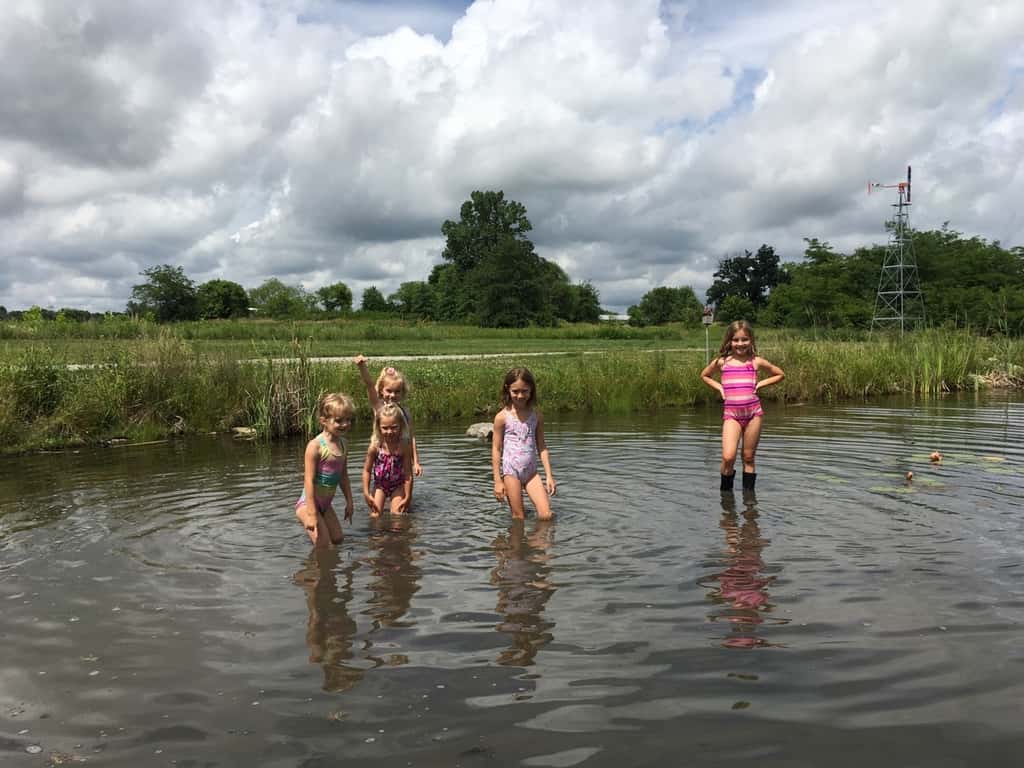 The girls swam in water other than a swimming pool for the first time today at Stella and Ruby’s house, and they loved it! Gwen was unsure of the muddy bottom, but she did finally jump in with everyone else. Josie freaked out when the dogs or goats got too close, but didn’t blink an eye at swimming with frogs and turtles. Abby is part farm girl. She loved everything!
