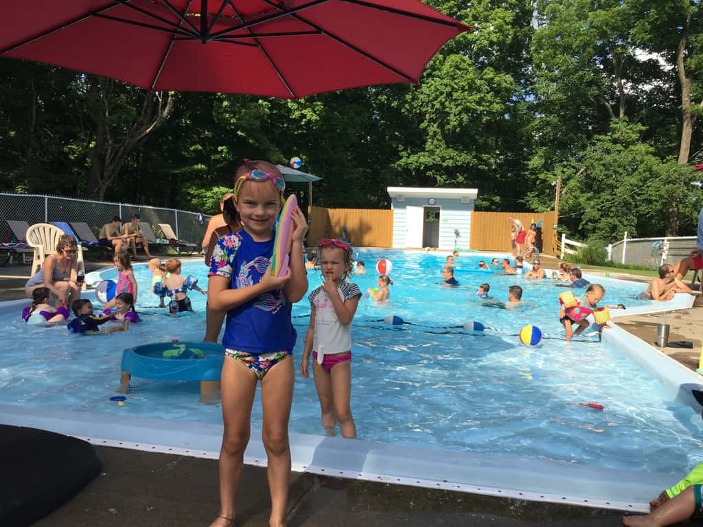 Fourth of July in Kenwood Hills! Josie ate way too much cotton candy, Abby enthusiastically helped with concessions, and Gwen dove for the rocket in the deep end until nine. Another fun neighborhood parade and party!
