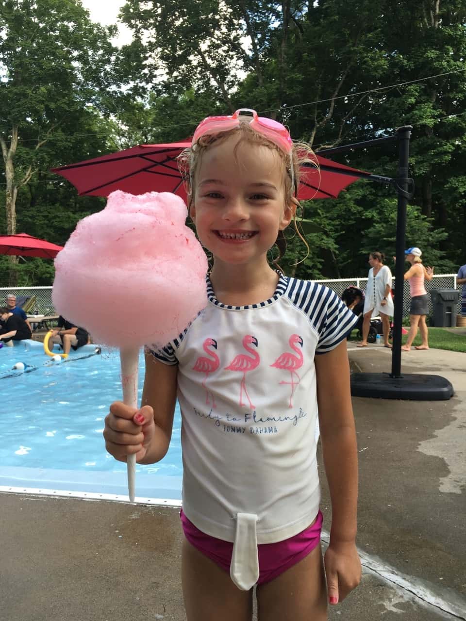 Fourth of July in Kenwood Hills! Josie ate way too much cotton candy, Abby enthusiastically helped with concessions, and Gwen dove for the rocket in the deep end until nine. Another fun neighborhood parade and party!