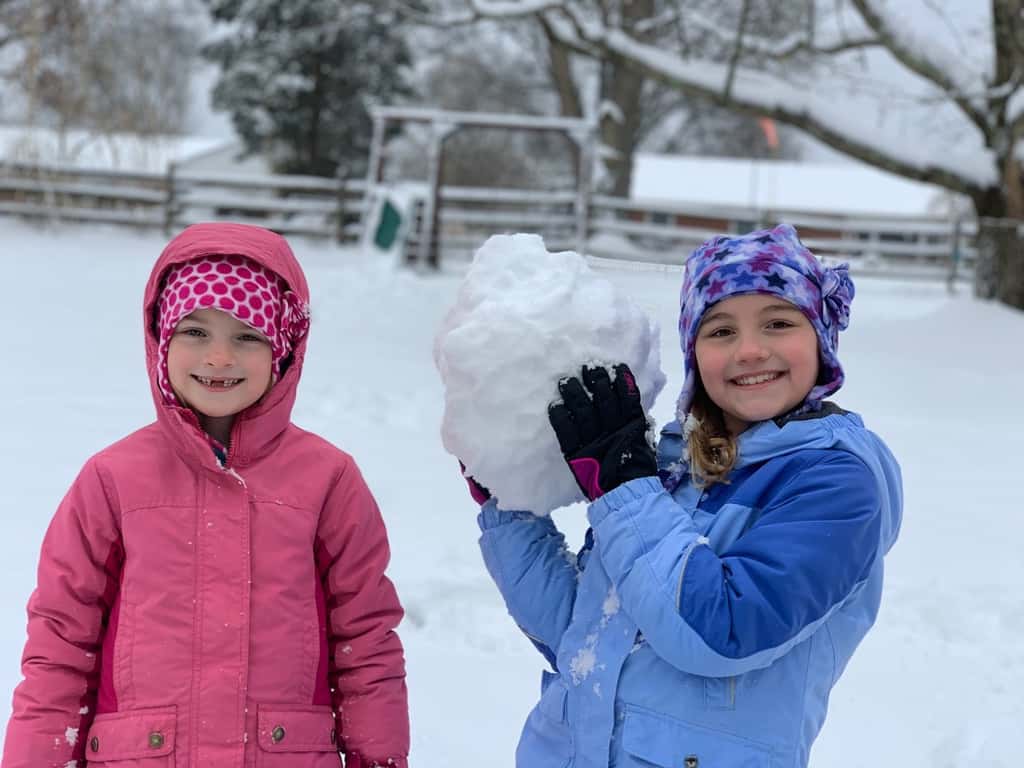More snow! The girls built the BEST snowman!