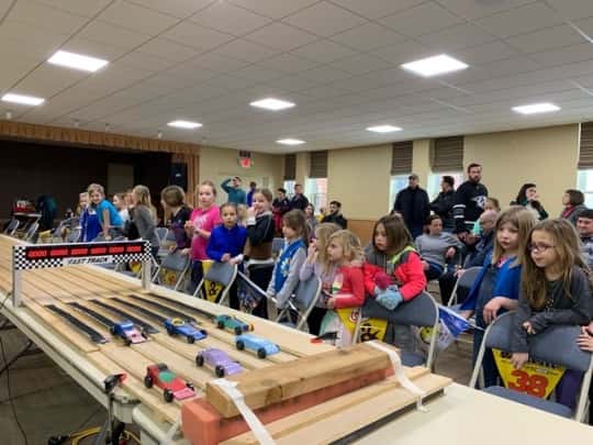 Josie’s sparkly birthday cake racer came in first place in our Daisy race of the 2019 Madeira Scouts Pinewood Derby! Abby’s Ravenclaw racer and Gwen’s rocket were both cool cars, but not quite fast enough to win (6th place).