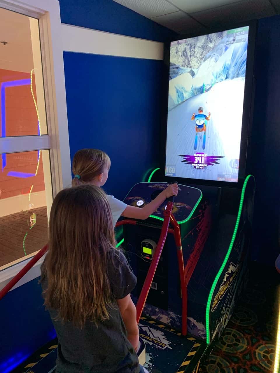 Our “restful” resort day at Disney included a thunderstorm, high winds, and cooler temps. We still enjoyed some arcade fun, lunch at Disney Springs, a surrey bike ride around the Boardwalk, swimming, a boat ride, and entertaining shows on the Boardwalk. Thank goodness the pools are heated!