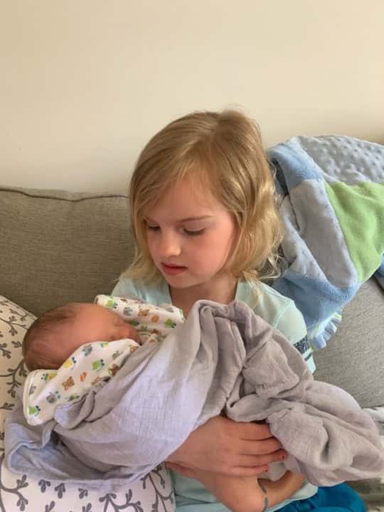 Gwen and Josie loved holding baby Nickolas James.