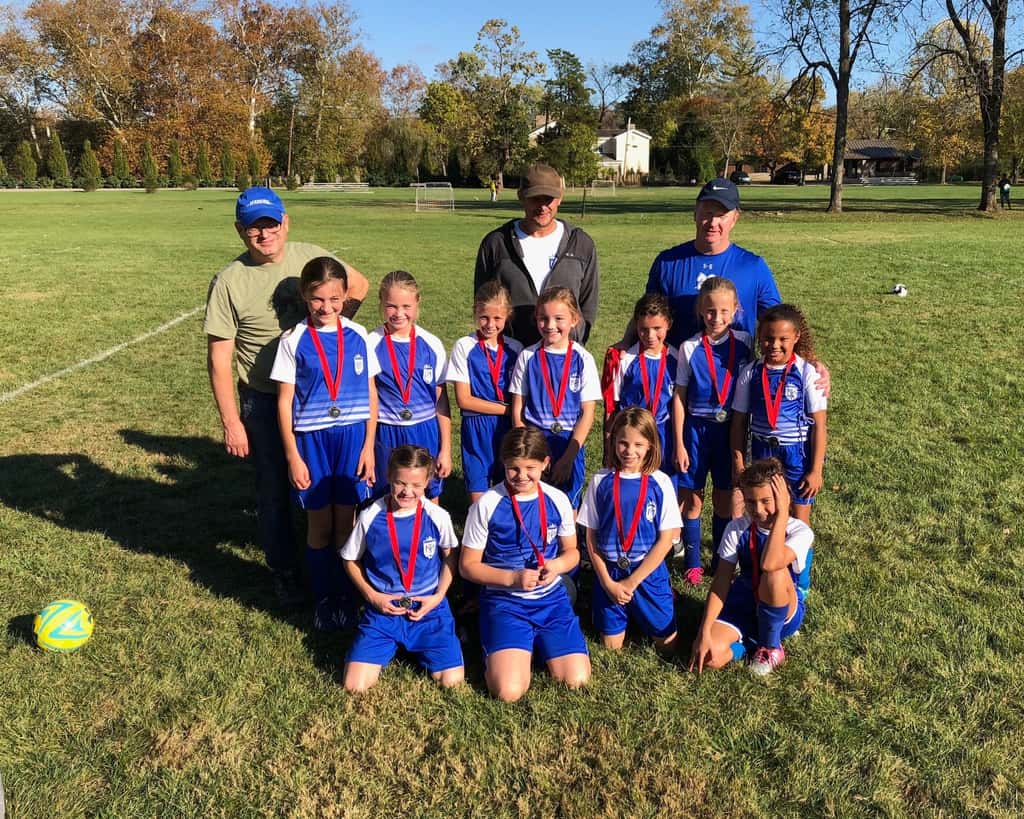 An amazing soccer season comes to an end with two wins, two losses, and some silver medals.

Abby’s coach Pat sent the parents an email with comments about each player. This cracks me up: “Abby Moose - “The Dealmaker” - About mid-season Abby told me she didn’t want to play goalie anymore - I responded, “Then score 2 goals today”…so she did…that was the last deal I made this season.”