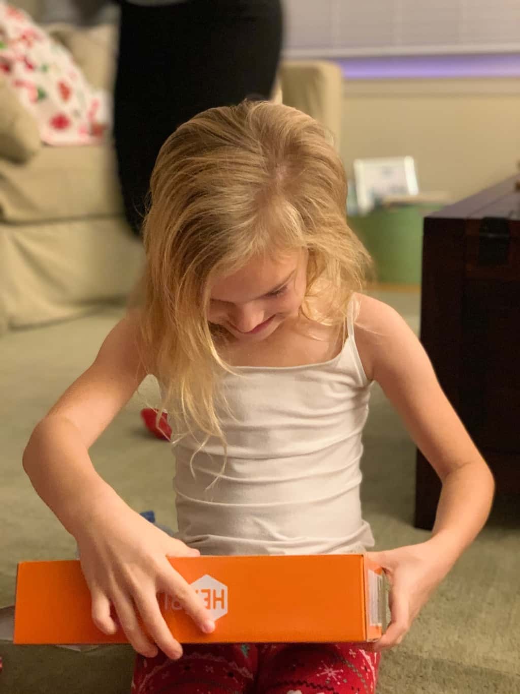 Abby tried to stay up to catch Santa; no luck. Christmas morning featured lots of fun new toys for our maker space.