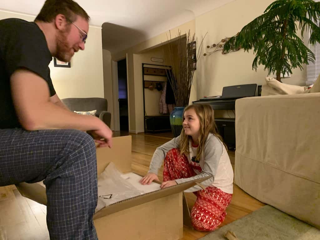 Abby tried to stay up to catch Santa; no luck. Christmas morning featured lots of fun new toys for our maker space.