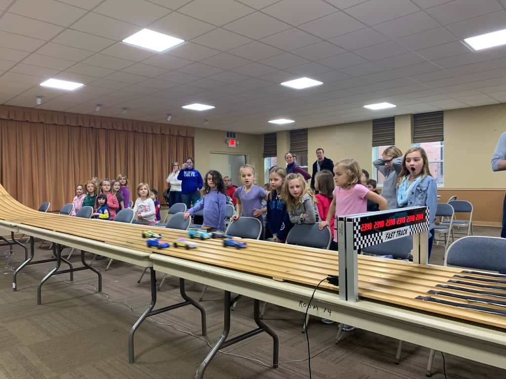 Gwen’s car won first place, and Josie’s car won the “most creative” design medal for their troop. Abby’s car won “most original design” for her troop. And Gwen’s car came in second place in the best of Madeira race for this year’s Madeira Pinewood Derby!